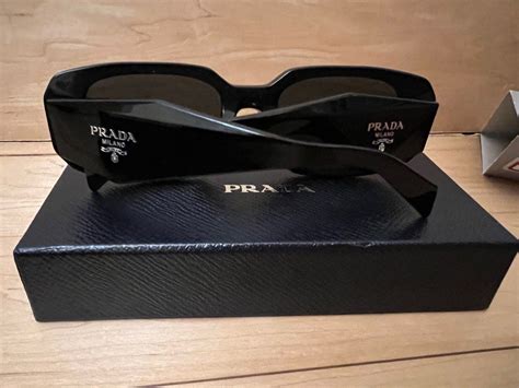 prada sunglasses brown women|Prada sunglasses receipt.